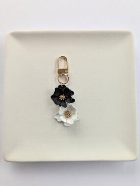 BLACK WHITE AND GOLD FLOWER BAG CHARM